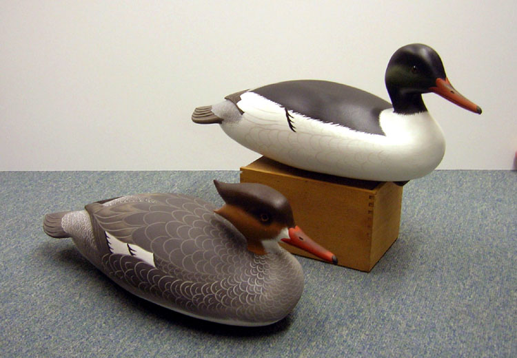 Common Mergansers carved by Jack Wood