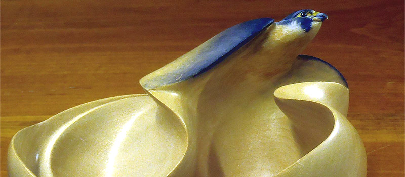 Peregrine In Motion - Carving by Dave Ahrendt