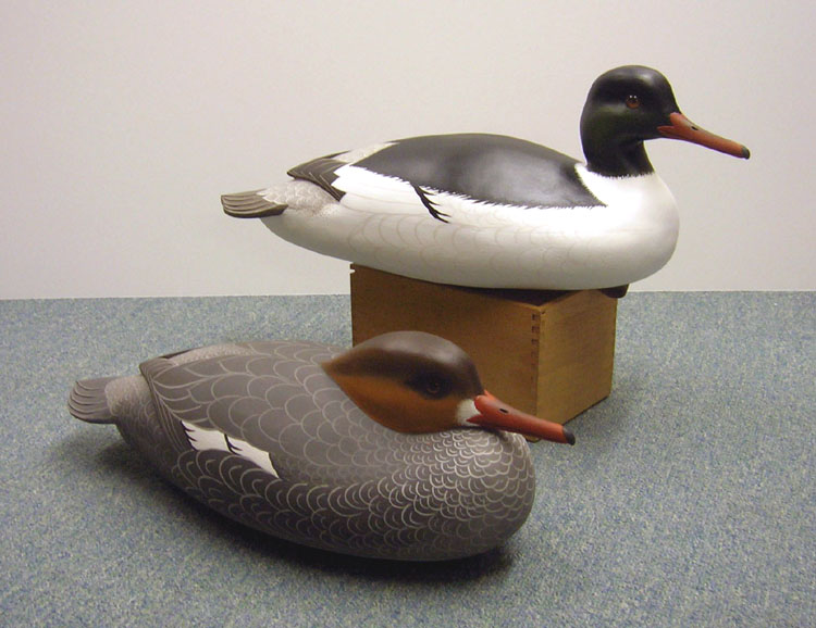 Common Merganser Pair carved by Jack Wood