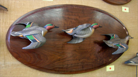 Ducks in flight by Josh Brewer